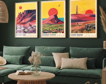 May include: Three vertical art prints featuring stylized landscapes of Wainstones, Roseberry Topping, and Easby Moor. Each poster displays a vibrant sunset, red sun, and topographical details with text labels at the bottom in a clean, graphic design style.