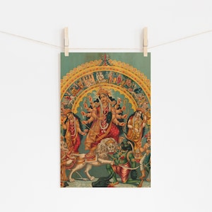 May include: A colorful vintage illustration of a Hindu goddess riding a lion. The goddess has multiple arms and is adorned with jewelry. The lion is depicted with a fierce expression and is surrounded by other figures.