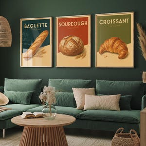 Peut inclure: Trois affiches murales rectangulaires illustrant du pain. L'affiche de gauche montre une baguette, celle du centre un pain au levain et celle de droite un croissant. Chaque affiche inclut le nom du pain et le texte Fresh Bread.