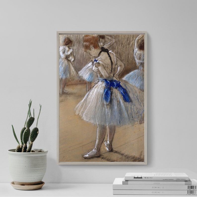 May include: A pastel drawing of four ballerinas in a dance studio. The ballerina in the foreground is wearing a white tutu with a blue ribbon. The other ballerinas are in the background, wearing similar tutus.