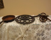 Antique cast Iron Penn Craft Cannon, Cast Iron Trivet, and Small Furniture Cast Iron Skillet