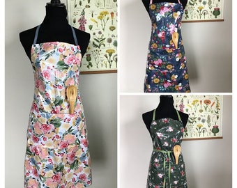 Wipeable adult apron, carpenter style, waterproof, fully adjustable, multi-purpose, large floral prints, laminate