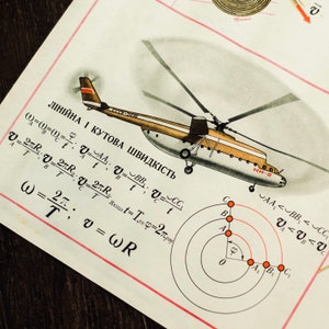 May include: Vintage illustration of a beige and brown helicopter, labeled MH-8, with rotating blades. The image includes mathematical formulas and diagrams related to linear and angular velocity, with text in a foreign language.