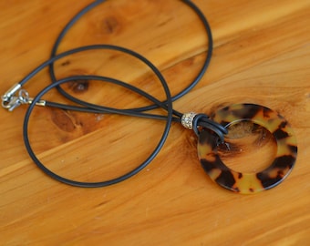 Eyglass necklace - holder. Animal print acrylic ring pendant. Brown, black glasses lanyard on rubber or leather cord.