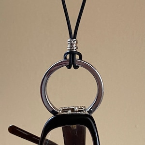 Eyeglass necklace. Hematite circle eyeglass holder. Black leather lanyard. Unisex stylish gray glasses holder.  Sunglasses holder.