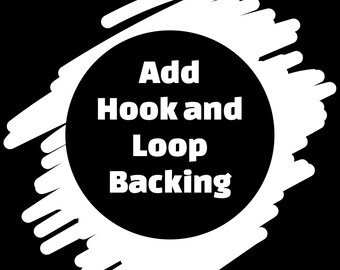 May include: A black and white graphic with the text "Add Hook and Loop Backing" in a white, bold font, centered within a black circle. The circle is surrounded by white brushstrokes against a black background.