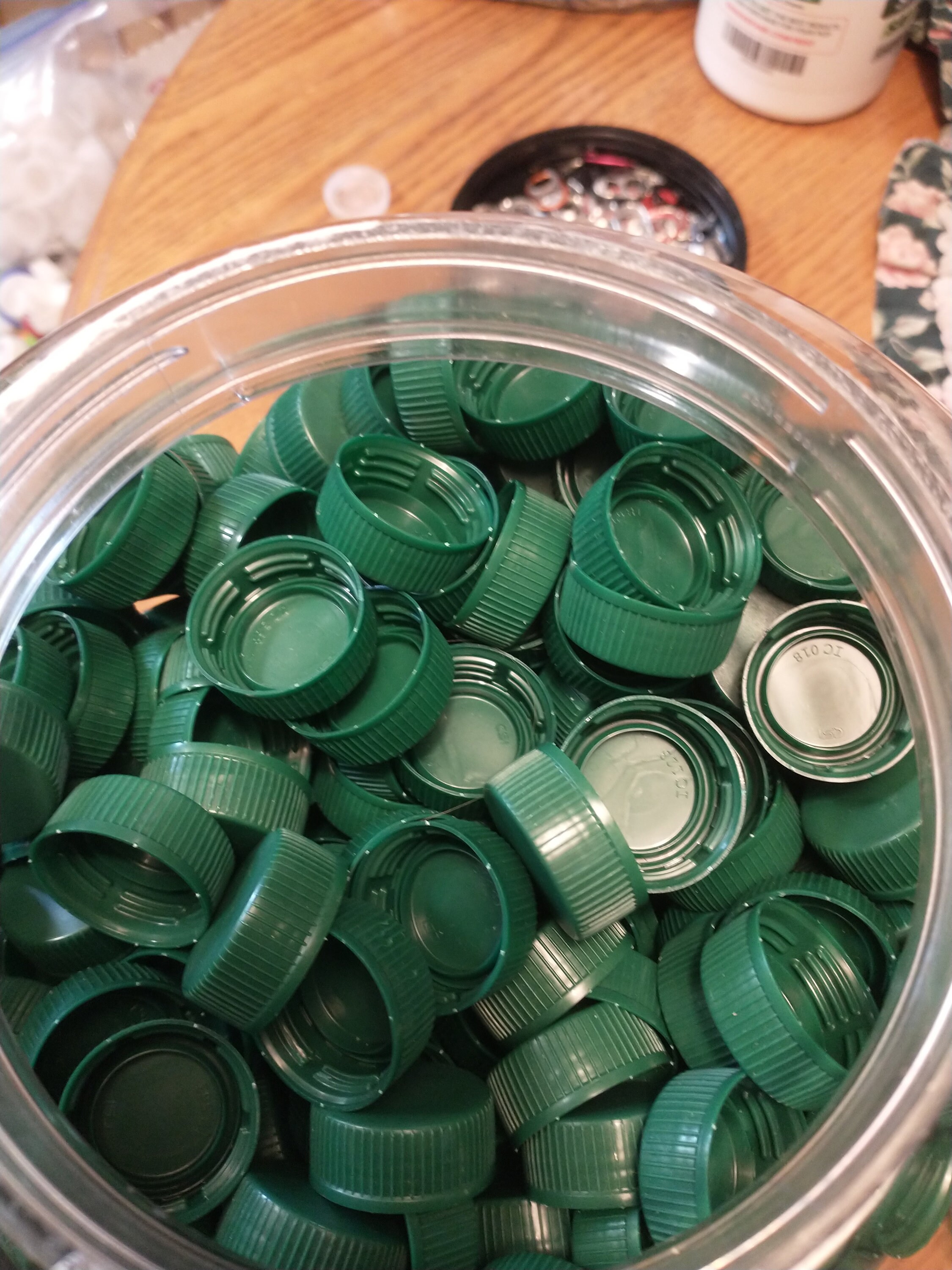 Colored Bottle Caps Set On White Background. Green, Red, White