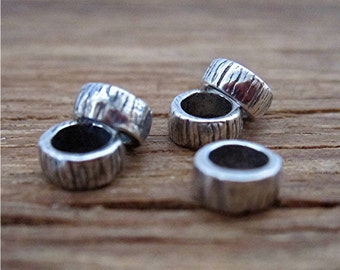 Two Tiny Lined Artisan Beads and Spacers in Sterling Silver (2 beads)