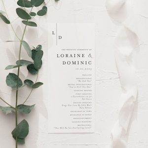 May include: A wedding ceremony program with the names Loraine & Dominic and the date 10.01.2023. The program lists the order of events, including the processional, readings, exchange of vows, and recessional.