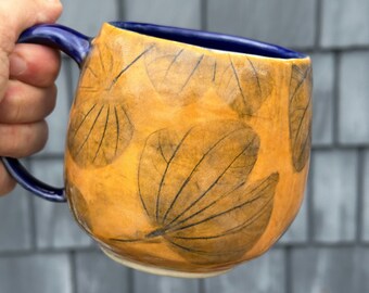 Handmade Stoneware Coffee Mug: Leaf Design, Orange & Cobalt Blue