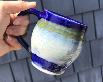Handmade Stoneware Coffee Mug: Blue, Green, and White Pottery
