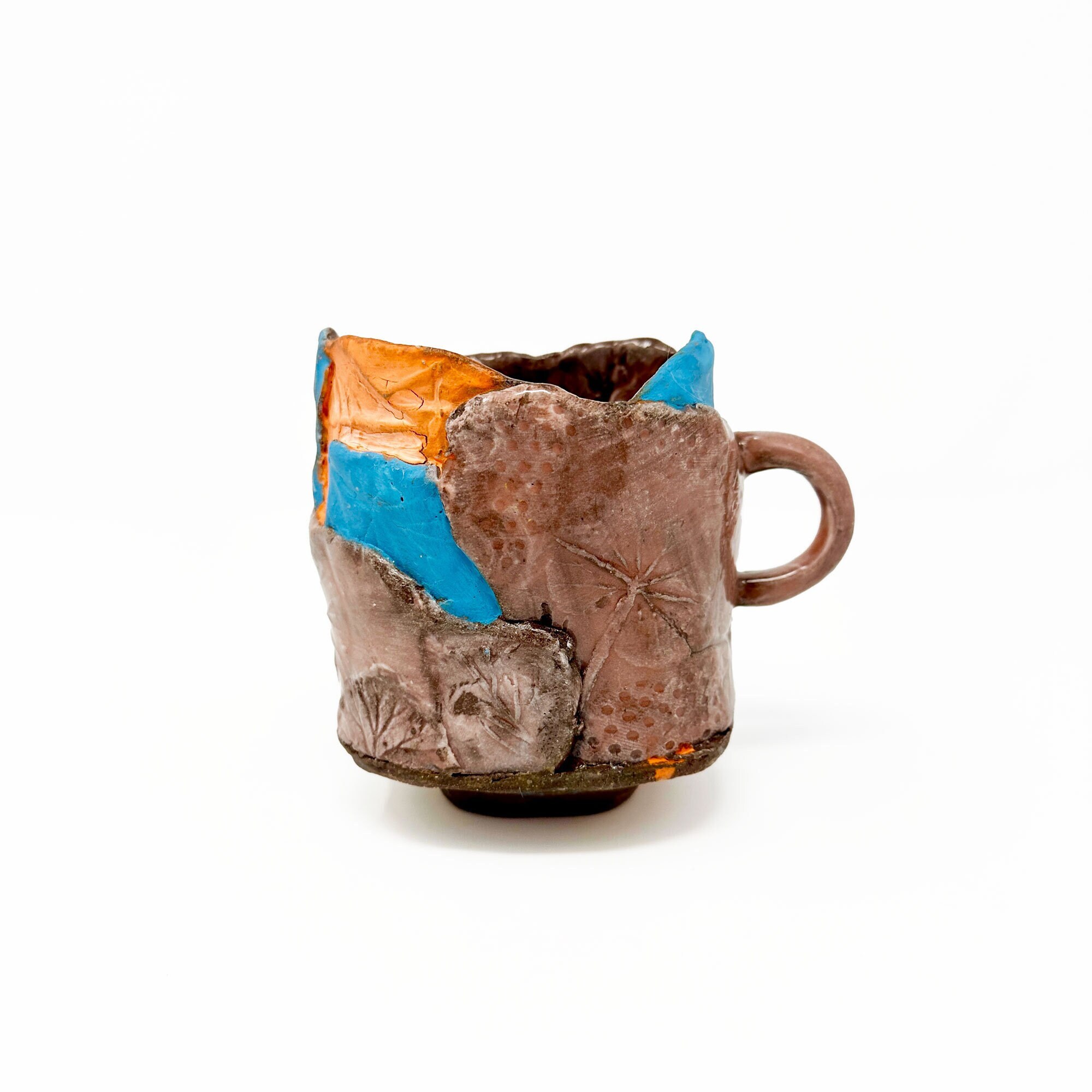 Handmade Stoneware Coffee Mug: Textured Ceramic Pottery with Leaf Design