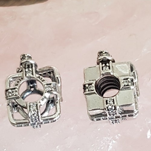 Authentic Pandora All Wrapped Up Open Work Charm Exquisite Sterling Silver shops Clear CZ Hallmarked S925 ALE RETIRED Nwot Item#791766CZ