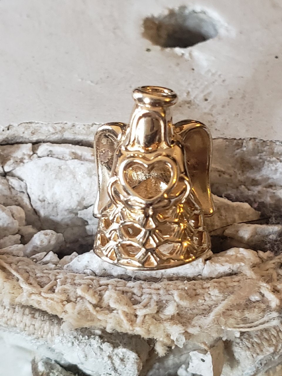 Pandora gold angel charm best sale