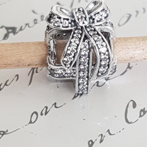 Authentic Pandora All Wrapped Up Open Work Charm Exquisite Sterling Silver shops Clear CZ Hallmarked S925 ALE RETIRED Nwot Item#791766CZ