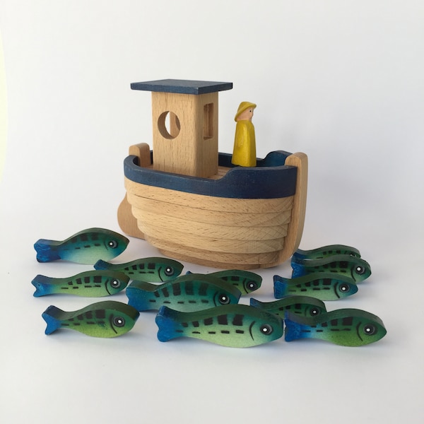 Fishing Boat puzzle containing 12 fish. Heirloom or executive gift.