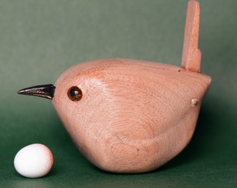 Wren with internal egg