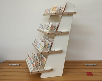 White plywood tiered display with four reversible shelves - for 75+ product cards or candles soaps – sturdy flat pack market and shop stand