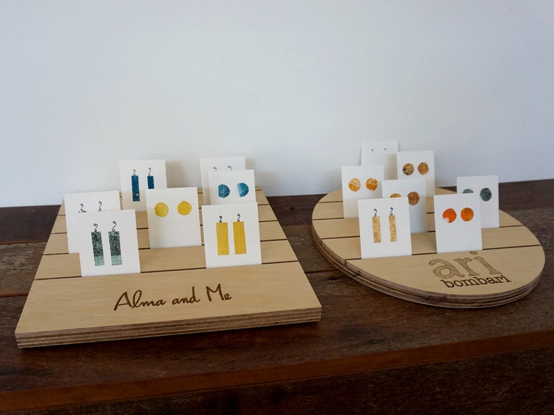 Slotted wooden circular jewellery card display board. Premium Etsy