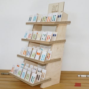 Wooden tiered display for cards with reversible shelves for product cards, soaps, candles, small items - flat pack for market and shop