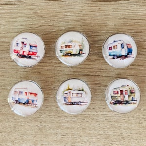 May include: Six round, white, glass cabochons with silver trim, each featuring a watercolor illustration of a vintage camper. The campers are painted in various colors, including red, blue, green, and yellow.