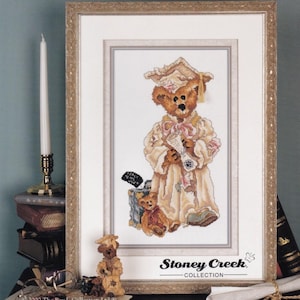 Stoney Creek Collection. Cross Stitch Pattern. Bailey...The Graduate. 891.