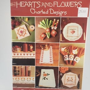 Boek met ontwerpen met harten en bloemen. 25111.