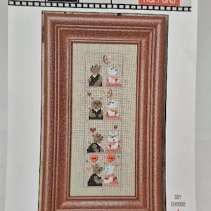 クロスステッチのパターン。「愛は起こる」。1775年。