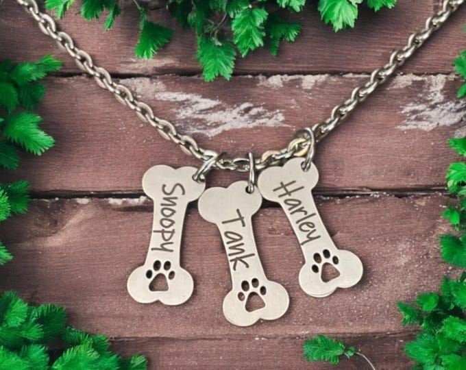 Featured listing image: Dog Bone Necklace Personalized, Dog Paw Necklace, Dog Jewelry, Bone Paw Print, Pet Memorial, Dog Charm Necklace, Engraved dog Jewelry
