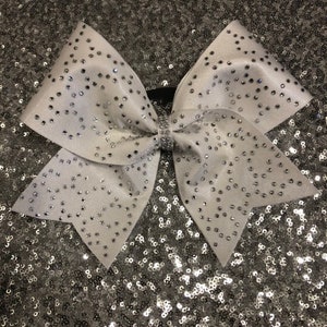 Beautiful white mystic bow with Rhinestones. Cheer hairbow