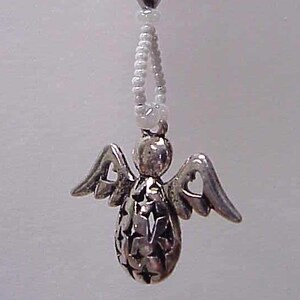 May include: A silver angel charm with a star-shaped design hangs from a white beaded chain with silver heart beads.