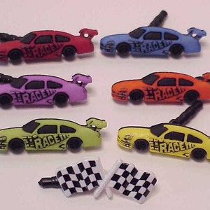 May include: A collection of colorful toy race cars in red, blue, purple, orange, green, and yellow. Each car has a spoiler and the word "RACE" printed on the side. Two checkered racing flags are also included.