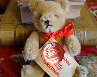 Vintage Hermann golden mohair 5-inch jointed teddy bear, original tags