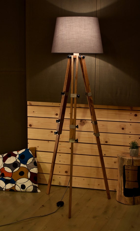 grey wooden tripod floor lamp