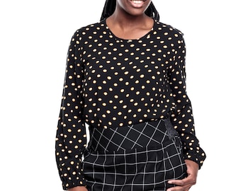 Tunica/ blouse "dots, white-yellow dots on black ground, front closed, slit in the back, wide sleeves with rubber in the hem, round neck