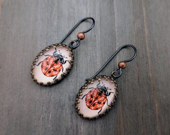 Vintage Style Ladybug glass dome folk art Earrings: Niobium Earwire, Glass Charm, ladybug glass cameo earrings