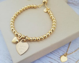 Bracelet boule slider en or jaune et vermeil - Avec breloque coeur en or jaune gravé