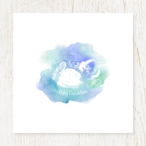 May include: A watercolour-style ultrasound image of a baby in a blue, green and purple colour scheme. The text "Baby Donaldson" is written below the image.