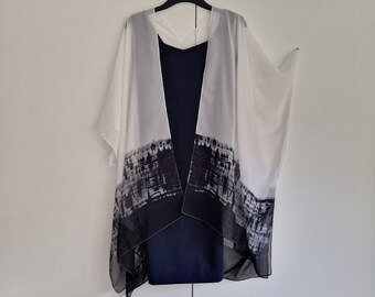 May include: A white sheer kimono with black and gray abstract print. The kimono has a V-neck and short sleeves.