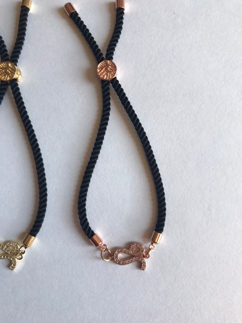 Adjustable cord Leo bracelet