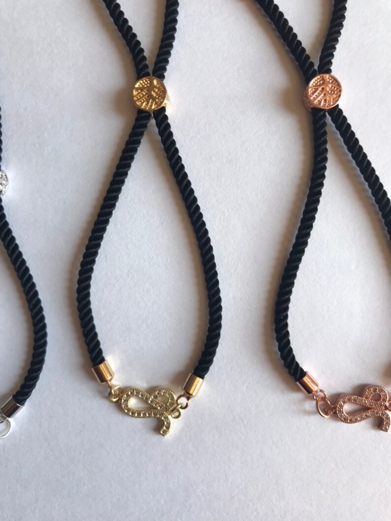 Adjustable cord Leo bracelet