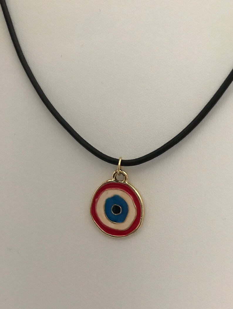 Funky red eye on black leather