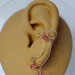 Bijou d'oreille en or et cristal avec jolis pendentifs