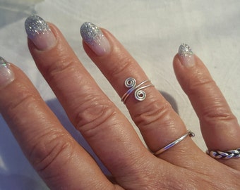 Bagues midi tourbillonnantes en argent. Jolie comme bague d'orteil ou de doigt !