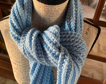 Light blue hand-knitted scarf in English rib