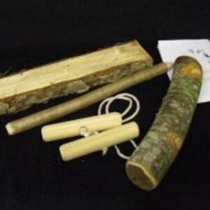 May include: A set of wooden tools for making a bow drill fire starter. The set includes a wooden spindle, a wooden fireboard, a wooden socket, and a length of rope.
