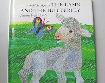 the LAMB And The BUTTERFLY (1988) By Arnold Sundgaard - Like NEW Condition - Glossy Hardcover With Dust Jacket- Illustrated by Eric Carle