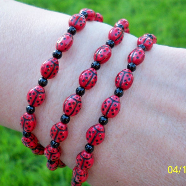 Beaded LadyBug (petite) bracelets, stretchy string, Czech glass