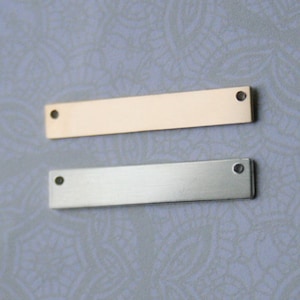 Aluminum pendants (10) 1/4&quot; x 1.75&quot;, two holes 14 ga. (.0625&quot;), Tumbled Smooth, Stamping Blanks, For Hand Stamping