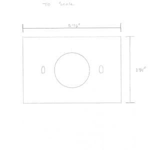 May include: A hand-drawn diagram of a rectangular object with a large central circle and two smaller oval shapes. The rectangle is labeled with dimensions: 5 1/2 inches wide and 3 3/4 inches high. The text "To Scale" is written above the rectangle.